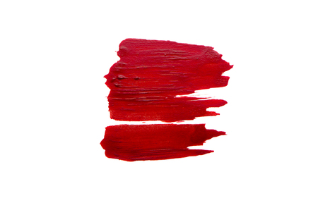Smear of red paint on white backgroundの写真素材