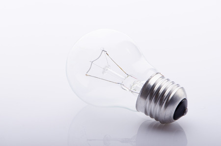 Electric lamp lies on a white backgroundの写真素材