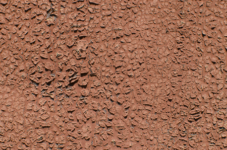 Background of a red cracked paint. Vintage texture.の写真素材