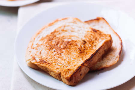 toast bread on white plateの写真素材