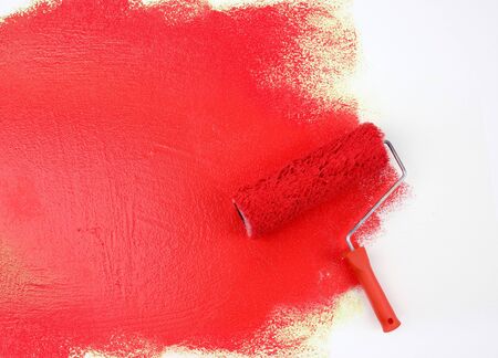 Red paint rollerの写真素材