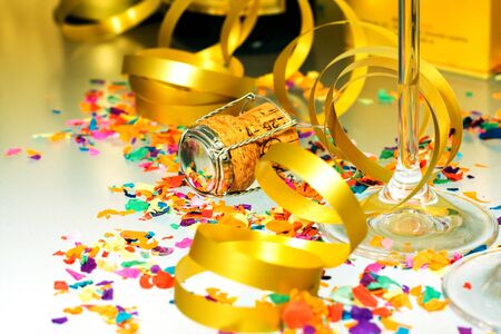 Glass of champagne with festive ribbons.の写真素材