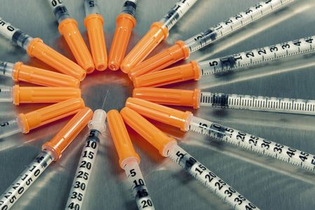 Many medical syringesの写真素材