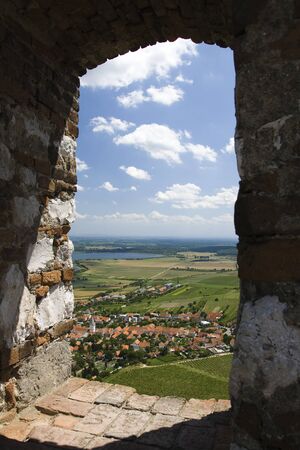 Sunny landscape with green grass and blue skyの写真素材
