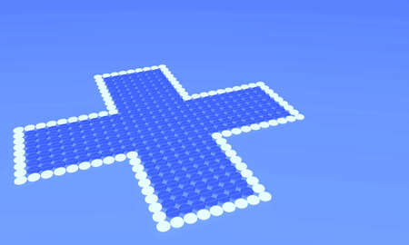 Cross made of small pillsの写真素材