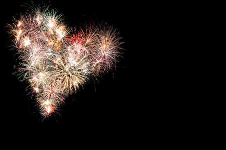 New year fireworks frame background full of colorの写真素材