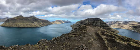 Amazing view in Faroe Islands (Denmark, Europe). Beautiful Panoramic Scene Of Nordic Islandsの写真素材