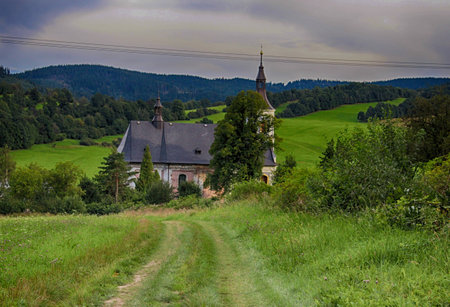 Partly renovated church in a small village.の写真素材