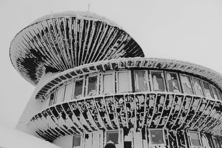 Wooden building at the top of the highest mountain in Czech Republic.の写真素材