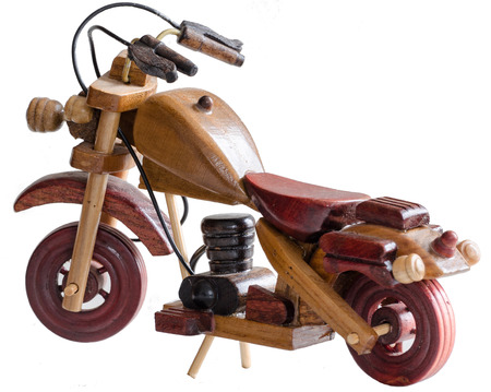 Souvenir Wooden motorcycle on white backgroundの写真素材