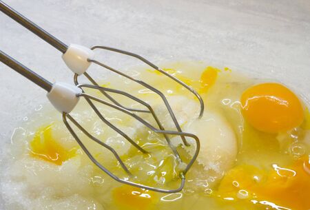 Preporation fo tasty homemade cake of plums and peachesの写真素材