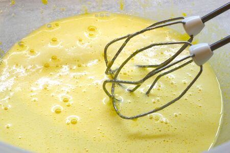 Preporation fo tasty homemade cake of plums and peachesの写真素材