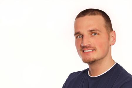 Portrait of a happy young man in T-shirt