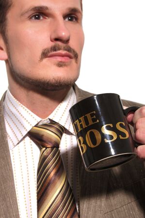 Businessman in the suit drinking coffee                      の写真素材