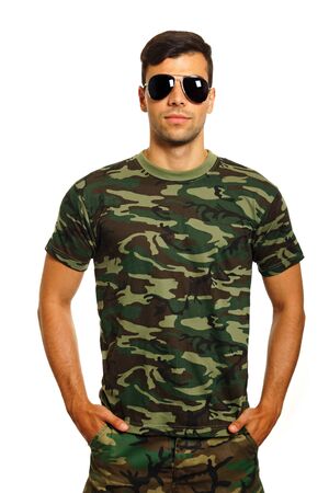 Military young man in sunglasses on white backgroundの写真素材