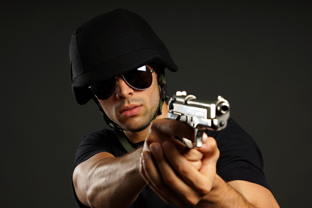 Special ops officer SWAT in black uniform