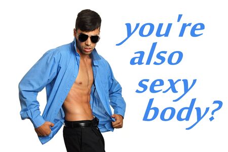 Young businessman poses with unbuttoned blue shirt and shows you his sexy abdomen, right you can...