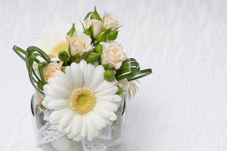 Beautiful wedding decoration with gerberas and roses, at right you can write some textの写真素材