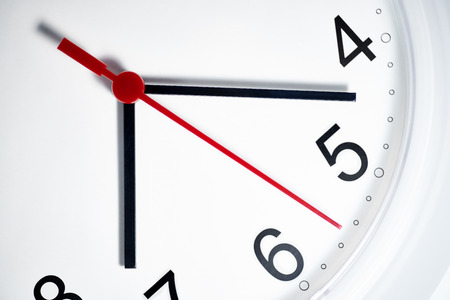 White clock face with clock handsの写真素材