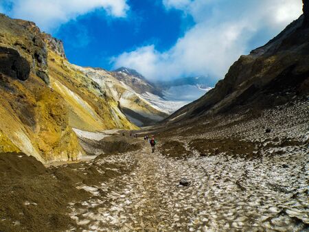 The Kamchatka peninsula - hikers in the path to the volcano craterの写真素材