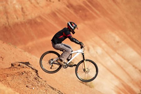 Extreme biker in red canyon