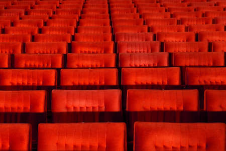 Red concert hall, opera or theatre seats.