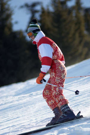 Ski girl in redの写真素材