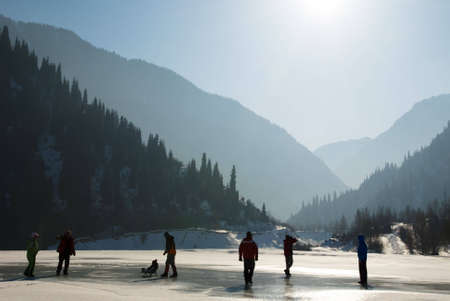 People silhouette on winter mountain likeの写真素材