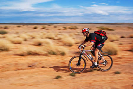 ALMATY, KAZAKHSTAN - May 1: Dmitry Jukov  in action at Adventure mountain bike cross-country marathon in desert "Jeyran trophy"  in Almaty, Kazakhstan May 1, 2008.のeditorial素材