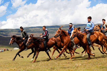 VALLEY ASSY, KAZAKHSTAN - August 12 : A traditional national nomad long-distance horse riding competition Bayga in action on AUGUST 12, 2009 in valley Assy, Kazakhstan.Photo taken on: August 12th, 2009のeditorial素材