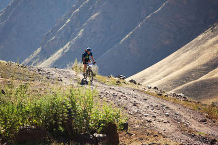 ALMATY, KAZAKHSTAN - SEPTEMBER 05: T.Dauranov(N4) in action at Adventure mountain bike cross-country marathon "Marathon Bartogay-Assy-Batan 2010" on September 05, 2010 in Almaty, Kazakhstan.のeditorial素材