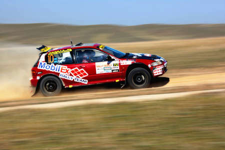 ALMATY, KAZAKHSTAN - APRIL 9: Danov and Revin (10) in action at auto competition "Rally Borly" April 9, 2011 in Almaty, Kazakhstan.のeditorial素材