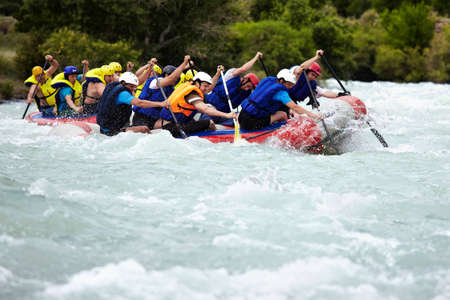 ALMATY, KAZAKHSTAN - JUNE 27: "Alina" team (first boat) in action at Rafting competition on Chilik river. June 27, 2011 in Almaty, Kazakhstan.のeditorial素材