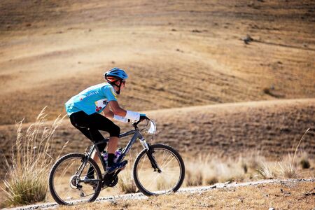 ALMATY, KAZAKHSTAN - SEPTEMBER 13: M.Dzolba (N13) in action at Adventure mountain bike cross-country marathon のeditorial素材