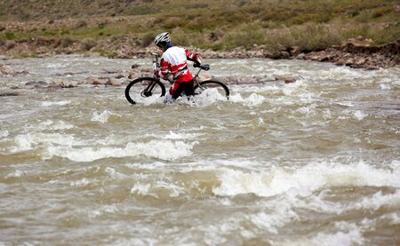 ALMATY, KAZAKHSTAN - MAY 3: R.Fayzullin (N17) in action at Adventure mountain bike cross-country marathon in mountains のeditorial素材