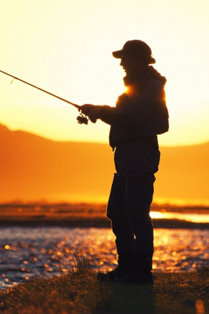 Fishing in the Mongolia - fisherman silhouetteの写真素材