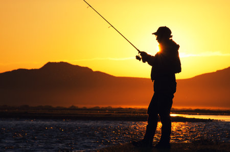 Fishing in the Mongolia - fisherman silhouetteの写真素材