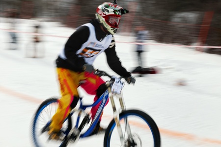 Almaty, Kazakstan - March 3: Beeline Snow BikeCross, March 3, 2012 in Almaty, Kazakstan. Competitor J.Jumakbaev (N56)のeditorial素材