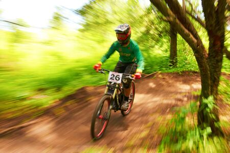 ALMATY, KAZAKSTAN - JUNE 30: S.Kagarov (N26) in action at  Mountain Bike sports event dedicated to the Day of the capital in Almaty, Kazakstan JUNE 30, 2013.のeditorial素材