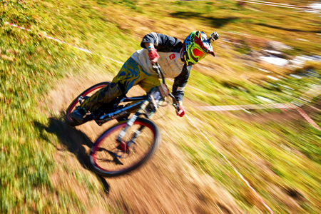ALMATY REGION, KAZAKHSTAN - OCTOBER 13: S.Kaganov (N61) in action at  mountain bike sports event "Red Bull Mountain Rage" October 13, 2013 in Almaty region, Kazakhstan.のeditorial素材