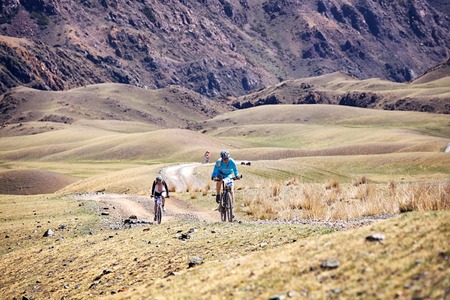 ALMATY, KAZAKSTAN - MAY 03, 2014: R.Kuznetcov (N9) in action at Adventure mountain bike cross-country marathon in mountains "Jeyran Trophy 2014"のeditorial素材