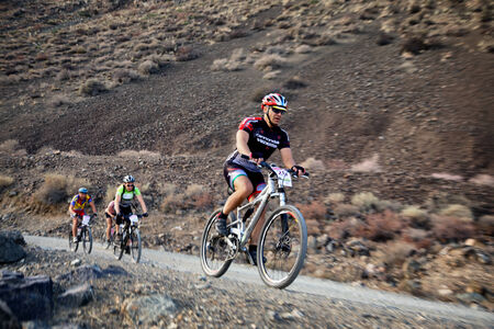 ALMATY, KAZAKHSTAN - SEPTEMBER 09, 2014: I.Baranov (N26) in action at Adventure mountain bike cross-country marathon "Marathon Bartogay-Assy-Batan "のeditorial素材