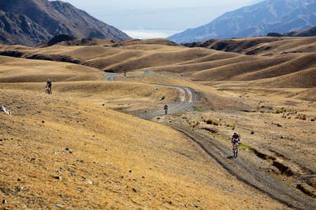 ALMATY, KAZAKHSTAN - SEPTEMBER 09, 2014: Unknown bikers  in action at Adventure mountain bike cross-country marathon "Marathon Bartogay-Assy-Batan "のeditorial素材