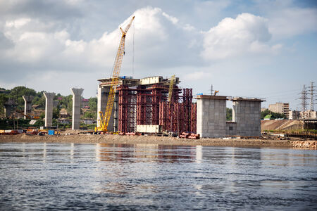 Construction of a new road bridge across the Yenisei River in Krasnoyarsk, Russiaの写真素材