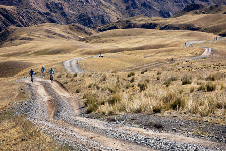 ALMATY, KAZAKHSTAN - SEP 06, 2015: Group of bikers in action at Adventure mountain bike cross-country competition in mountains "Bartogay Marathon 2015"のeditorial素材