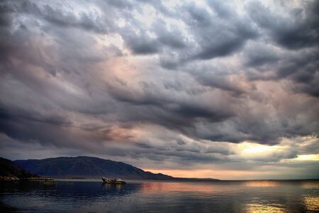 Sunset on Bukhtarma lake in Eastern Kazakhstanの写真素材