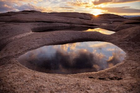 Spring sunset in desert mountains Bektau-Ata, Kazakhstan, Central Asia.の写真素材