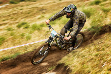 ALMATY, KAZAKHSTAN - AUGUST 223, 2015: B.Stetcyn (N30) in action at Mountain Bike sports event DOWNHILL EXTREME WEEKEND.のeditorial素材