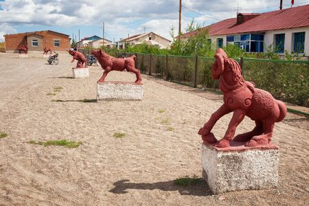 WEST MONGOLIA , MONGOLIA - AUG 05, 2011: Statues of mythical animals on center of the village Naranbulag.のeditorial素材