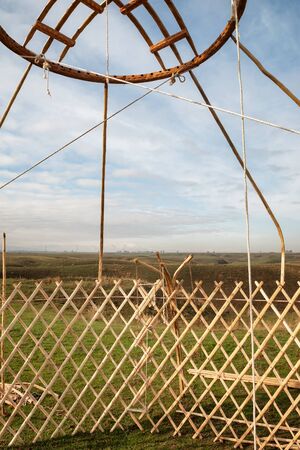 Shanyrak - The wooden crown of the yurt. Yurt - portable, bent dwelling structure traditionally used by nomads in the steppes of Central Asia as their home.の写真素材